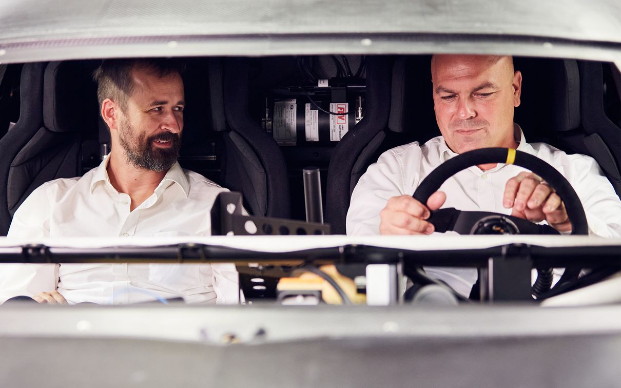Stefan Murrweiss and Bastian Rosenauer sit in the cockpit of the Audi S1 Hoonitron